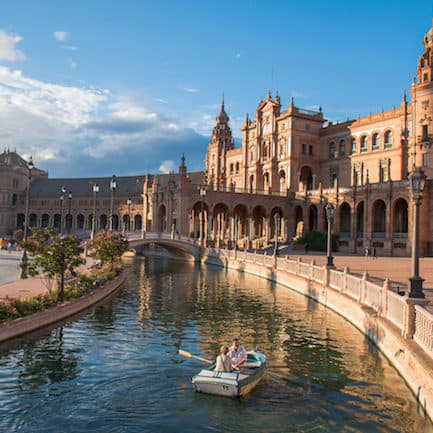 rowing a boat in plaza de españa, seville